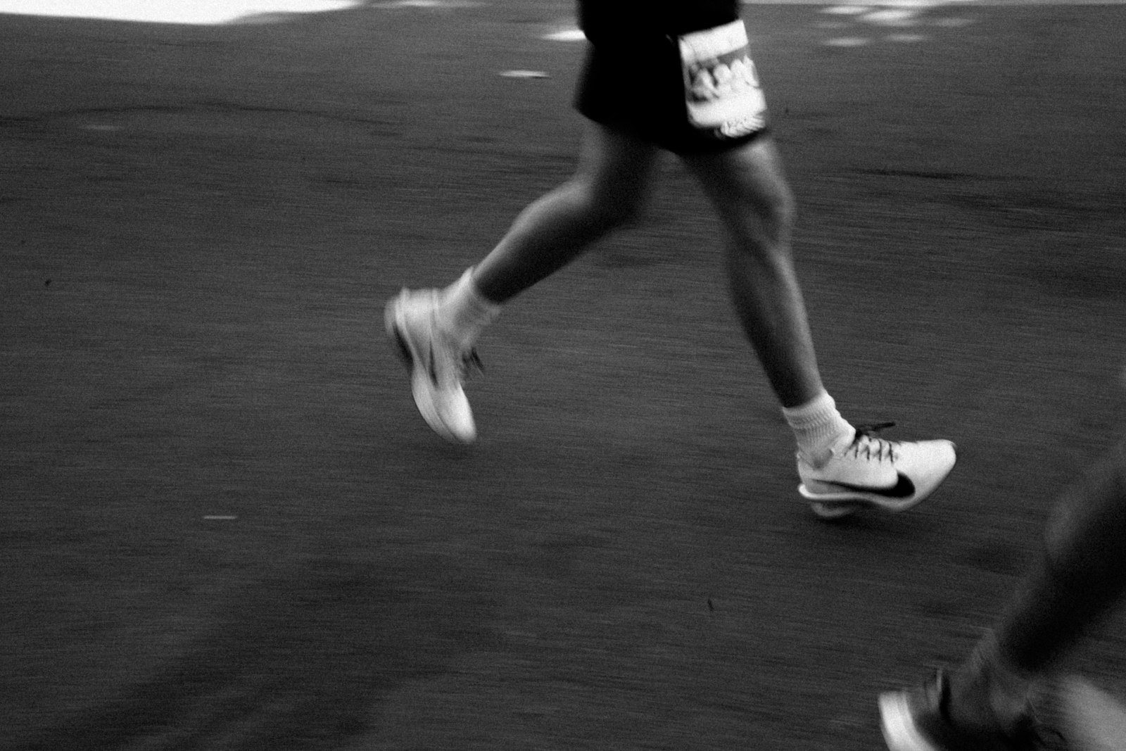 Runners legs in motion during a race